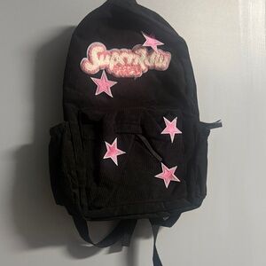 Black Backpack with Pink Star Patches